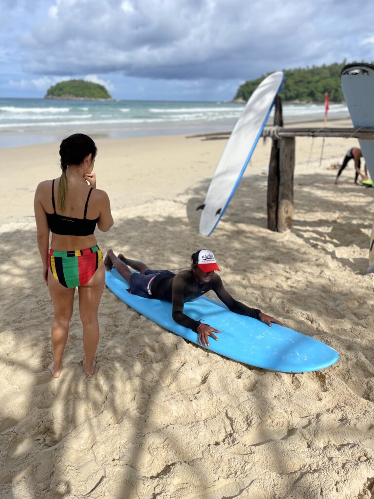 surfing at kata beach