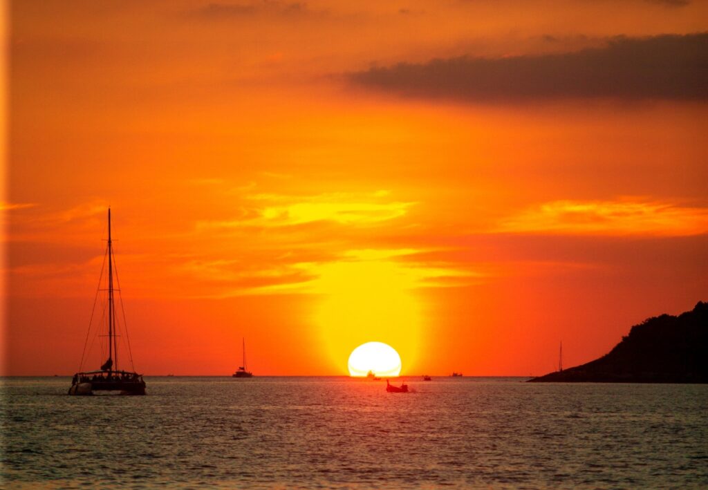 Kahung Beach (Coral Island) & Sunset Promthep Cape by Sailing Yacht - Nikorn Marine